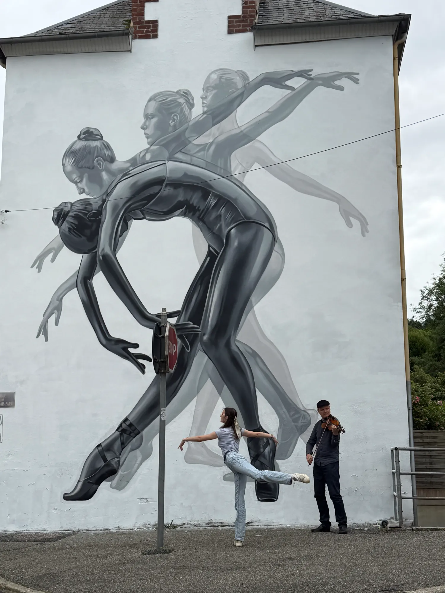 Ballet mural painted by Odeith in Morlaix, Brittany, France featuring four dancers in motion 1