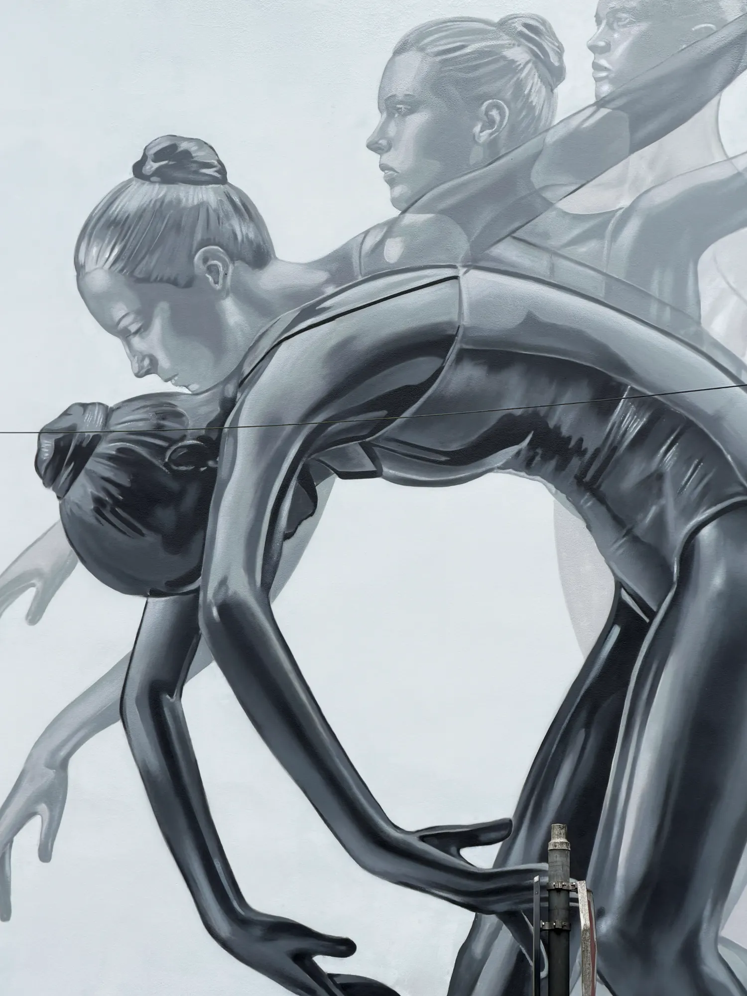 Ballet mural painted by Odeith in Morlaix, Brittany, France featuring four dancers in motion 2