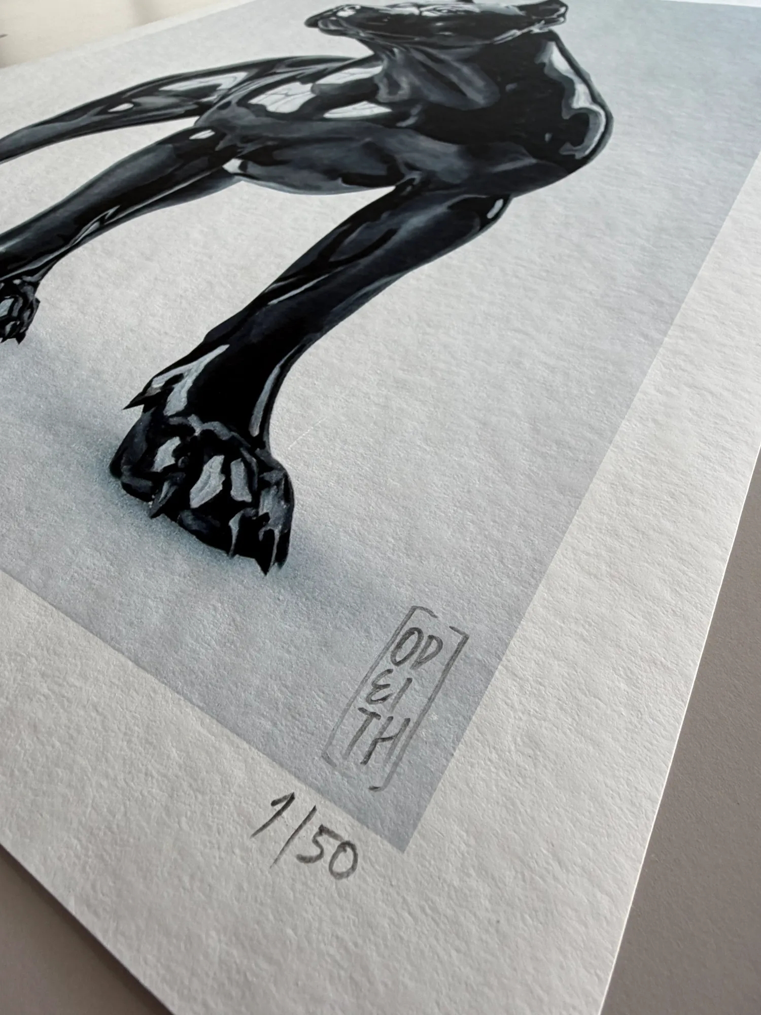Close-up detail of Sentinel pitbull print showing reflective black porcelain effects and sculptural highlights