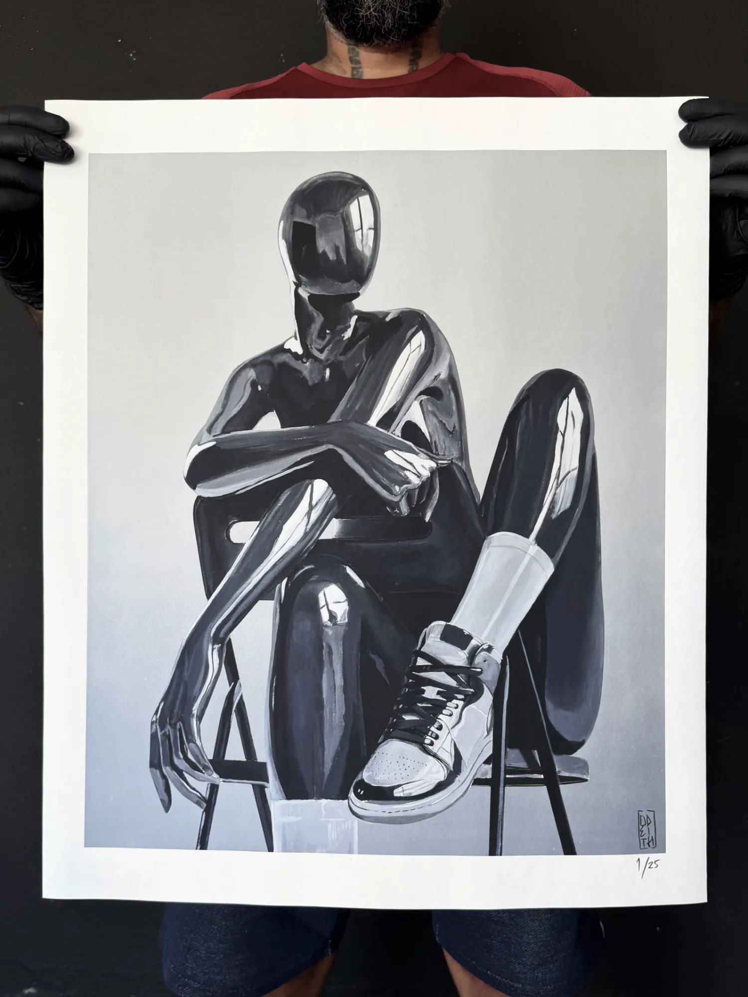 Faceless limited edition fine art print by Odeith featuring a faceless black porcelain doll seated in sneakers.