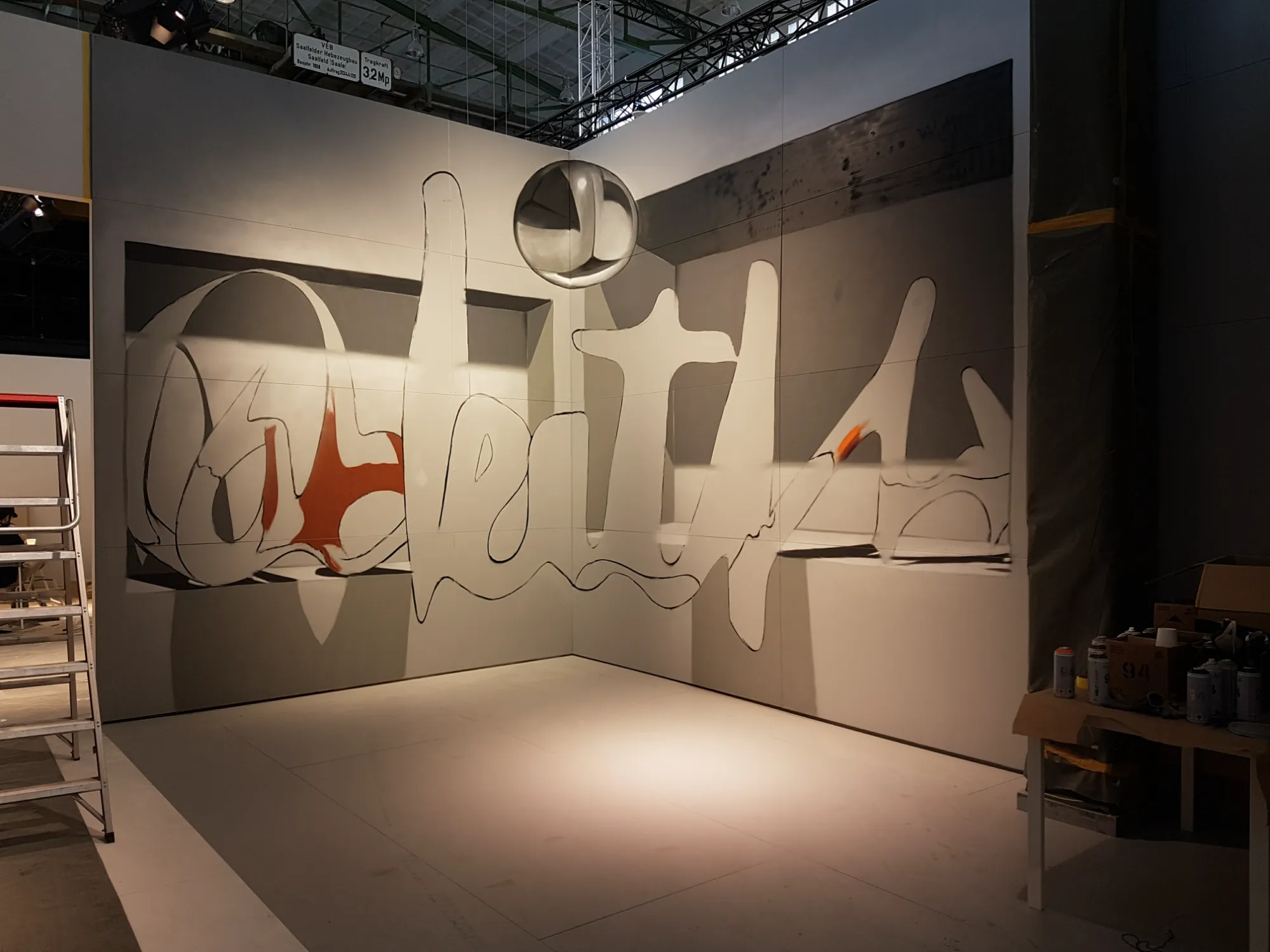 Work in progress shot showing the initial layout and outlines of the 4-meter 3D anamorphic mural in Dresden.