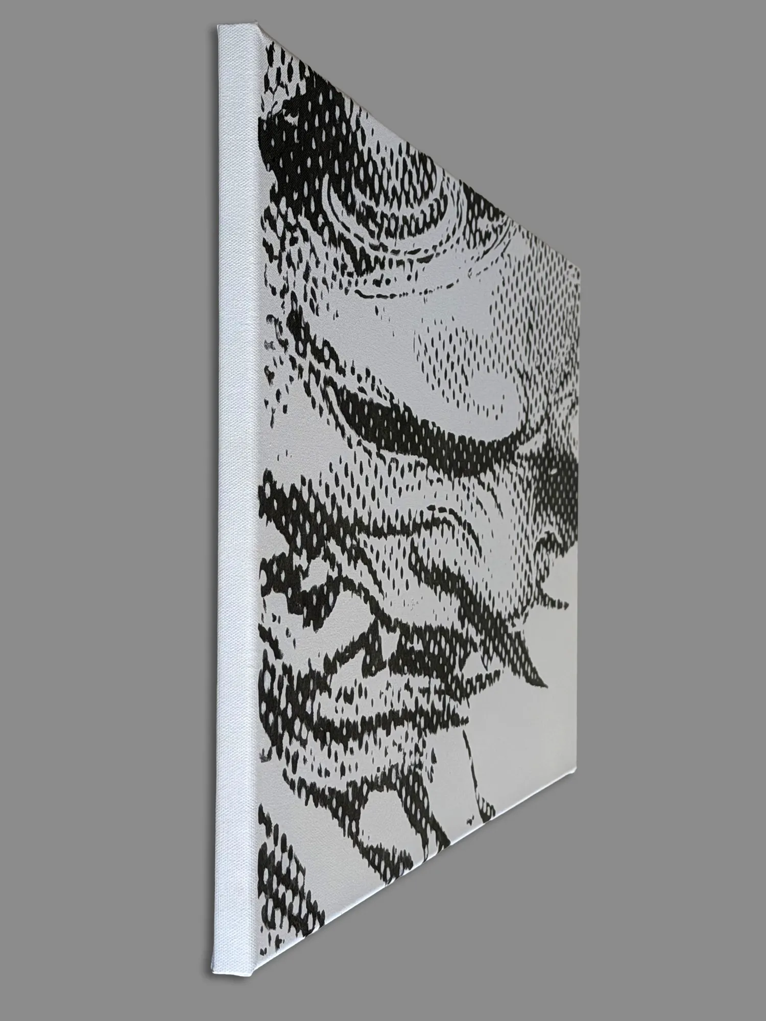 Side angle view from the left revealing the sharp 3D optical illusion of a Japanese Oni mask in high-contrast black and white halftone.